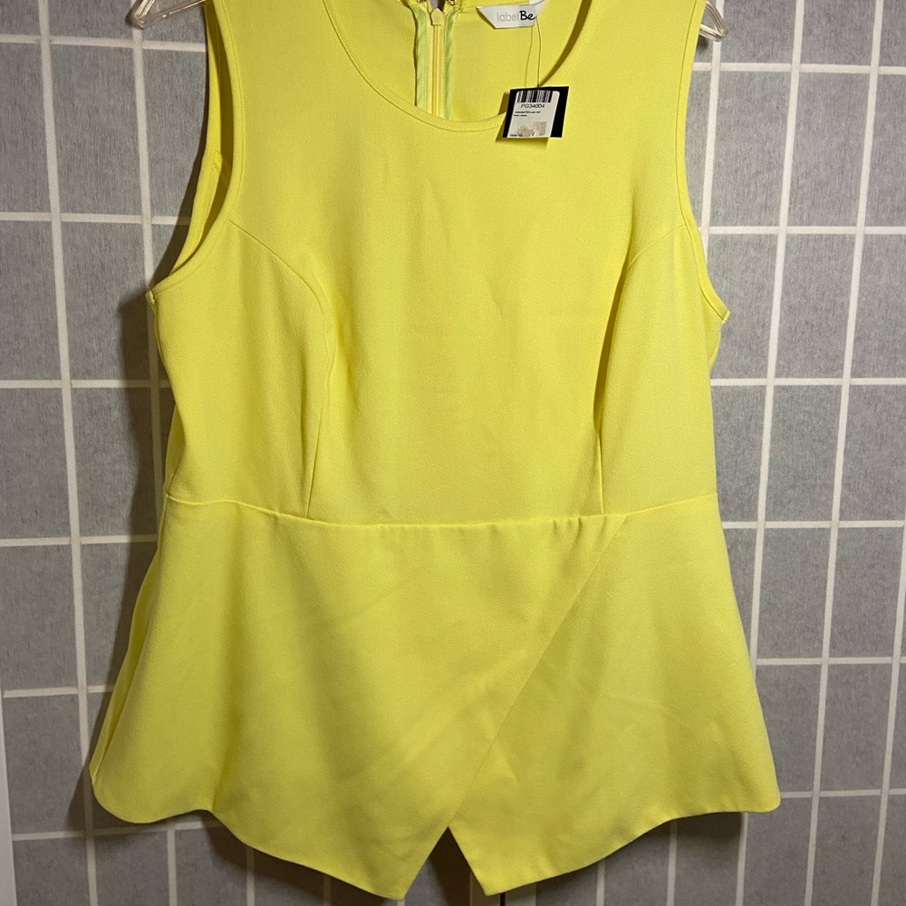 Peplum sleeveless top